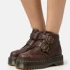 Dr. Martens Devon Flwr - Enkellaarsjes Met Plateauzool - Dark Brown