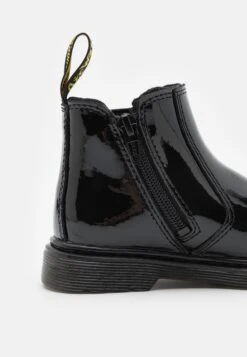 Dr. Martens 2976 J - Korte Laarzen - Black -Bootsmith Hub Verkoopwinkel 322802e461014171a5f30610bd14f276