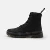 Dr. Martens Combs Unisex - Veterboots - Black