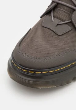 Dr. Martens Tarik Zip Unisex - Enkellaarsjes Met Plateauzool - Gunmetal -Bootsmith Hub Verkoopwinkel f52f3a693df04f65a0201bcc685f8038